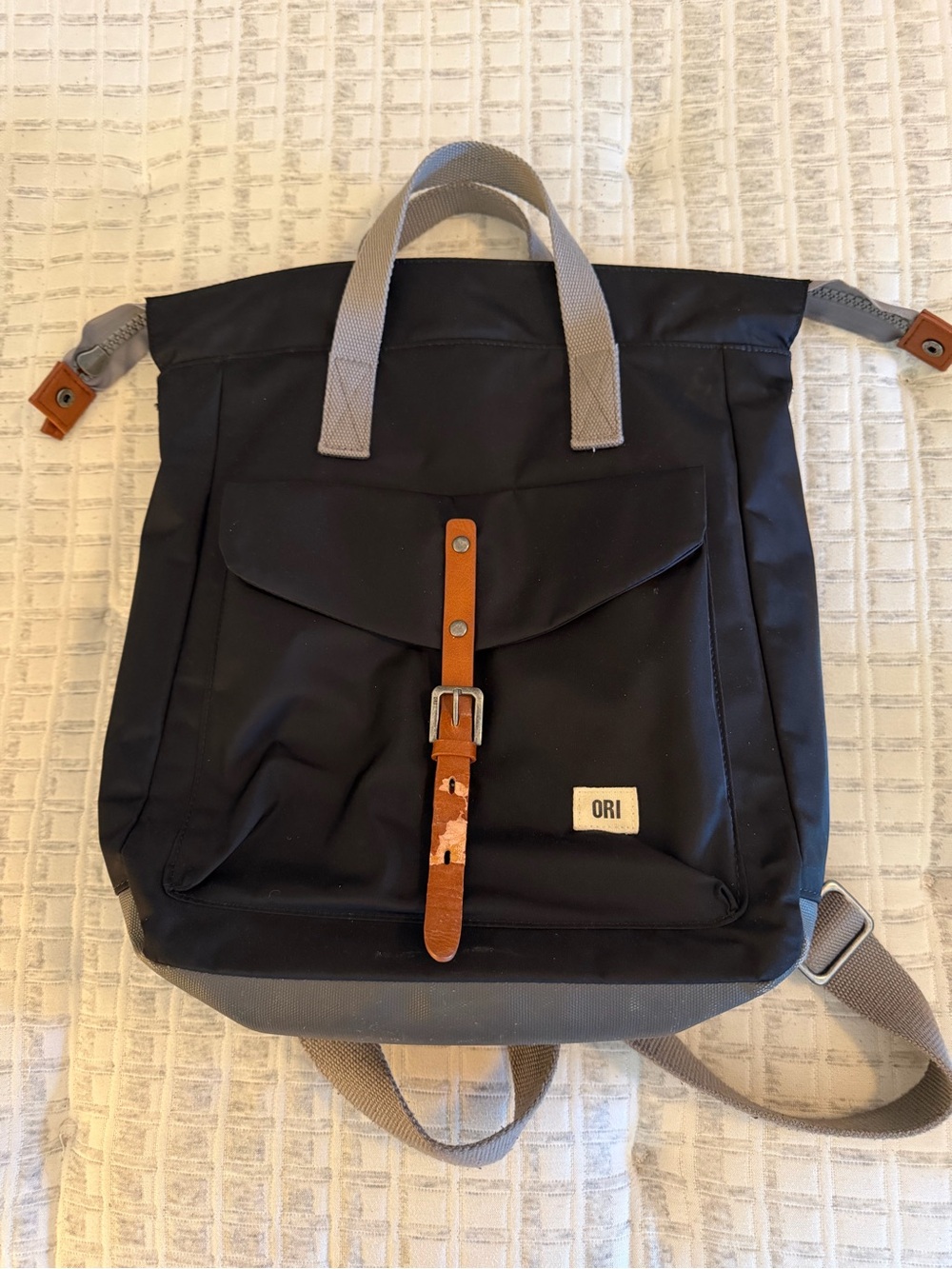 Black Backpack with Brown Leather Strap